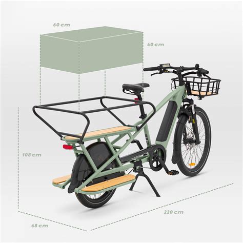 Vue d'ensemble du vélo cargo Décathlon R500e avec porte-bagages avant et arrière.