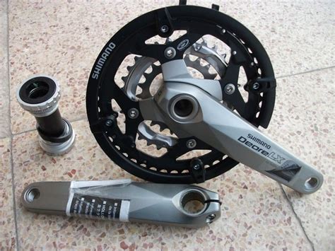 Schéma technique du pédalier Shimano Deore LX FC-M580, mettant en évidence l'axe Hollowtech II et la compatibilité avec les cadres BSA.