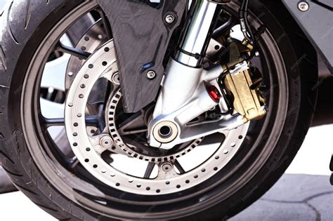 Vue détaillée d'une prise de compteur de roue avant de moto avec explications sur son fonctionnement