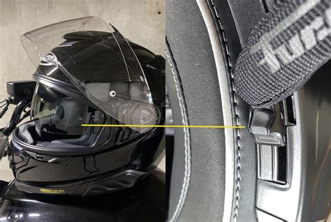 Vue rapprochée du mécanisme de verrouillage de l'écran du casque HJC RPHA 70 et de la lentille Pinlock.