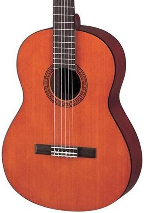 Guitare classique Yamaha CS40 avec une finition naturelle brillante, mettant en valeur le bois.