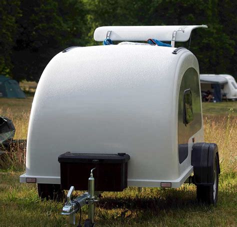 Illustration d'une caravane attachée à un trike