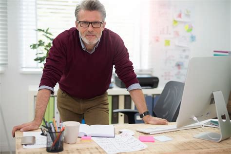 Photo ou illustration d'un gérant d'entreprise
