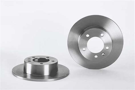 Comparaison visuelle des différents types de disques de frein Brembo : conventionnel, rainuré, percé, flottant