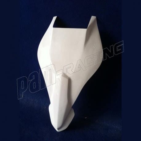 Photographie rapprochée d'un passage de roue Sebimoto en fibre de verre, mettant en évidence la texture et les renforts.