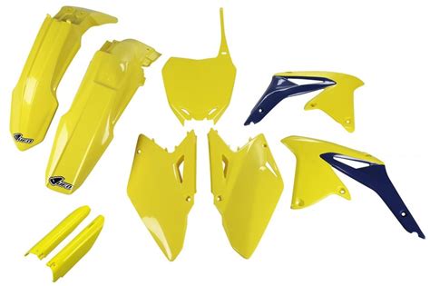 Schéma illustrant les différents éléments d'un kit plastique complet pour moto tout-terrain.