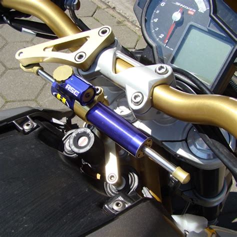 Schéma illustrant le phénomène de guidonnage sur une moto de cross.