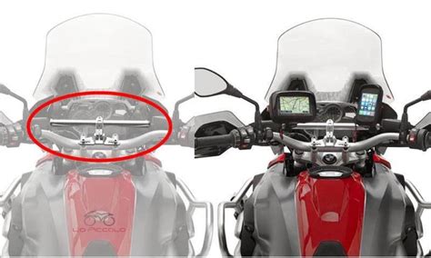 Détail du poste de pilotage de l'Aprilia Caponord 1200, montrant le guidon, le tableau de bord et les commandes.