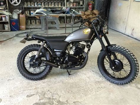 Photo avant/après de la transformation d'une Honda CM 125 en Scrambler