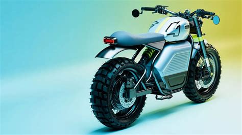 Illustration d'une moto électrique de type scrambler pour enfant, mettant en avant son design robuste et ses pneus adaptés à divers terrains.