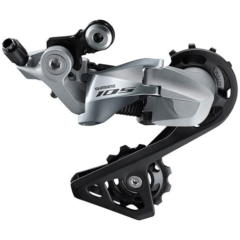 Gros plan sur le mécanisme du dérailleur arrière Shimano 105 R7000, mettant en évidence la technologie Discret Shadow et le montage Direct Mount.