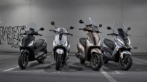 Schéma comparatif des dimensions et du poids des modèles Piaggio MP3