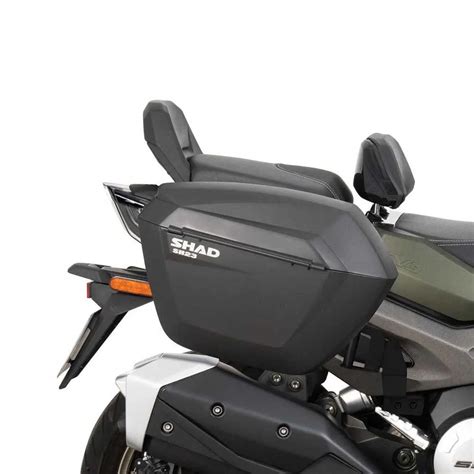 Vue latérale du Kymco CV3 avec ses valises latérales.