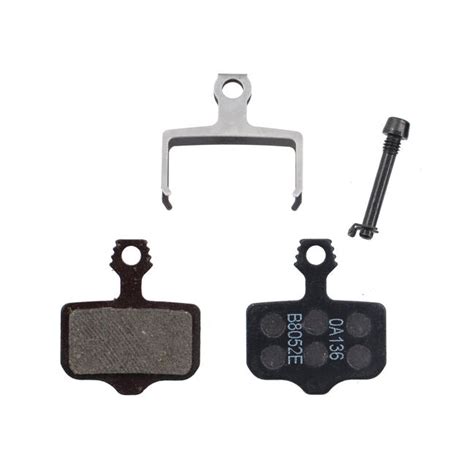 Comparaison côte à côte de deux types de plaquettes de frein SRAM (type DB et type Elixir) pour illustrer les différences de garniture.