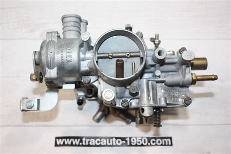 Vue détaillée du mécanisme de starter sur un carburateur Solex, montrant le disque en laiton et sa commande