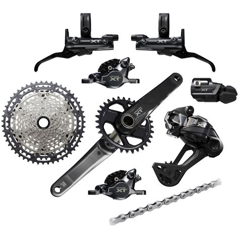 Vue éclatée d'un dérailleur arrière Shimano Deore XT avec la vis B-Tension mise en évidence