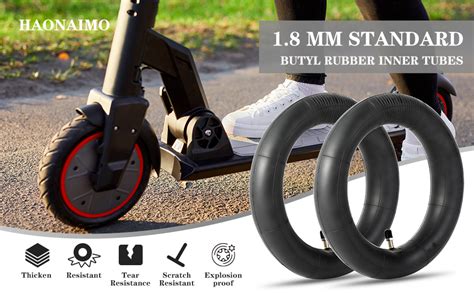 Illustration montrant les différentes parties d'une roue de trottinette Xiaomi M365 : pneu, chambre à air, jante