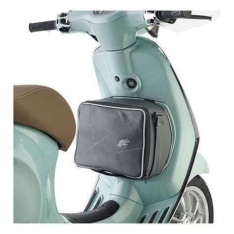 Schéma d'installation d'une sacoche tunnel sur un scooter