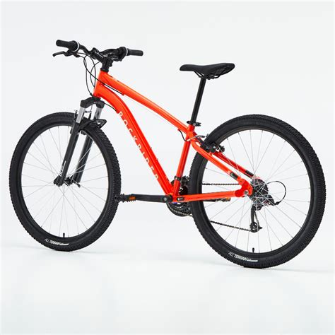 Image du VTT Rockrider EXPL 50 dans un environnement naturel.