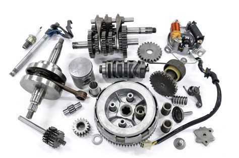 Montagne de pièces détachées d'une moto ancienne