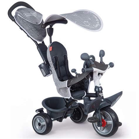 Vue détaillée du tricycle Smoby Baby Driver Plus avec ses accessoires