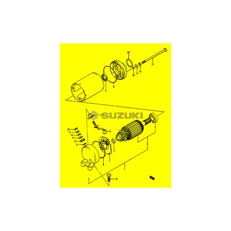 Vue détaillée du démarreur Suzuki GSX 1300 BK avant son retrait, mettant en évidence les vis de fixation et la connexion de masse