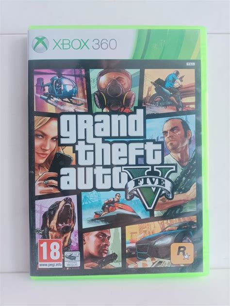 Une Xbox 360 avec l'autocollant Rockstar North