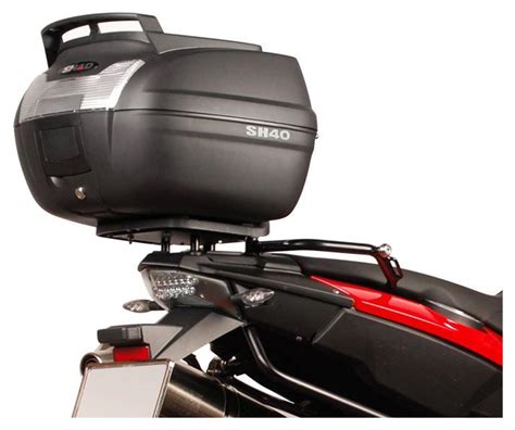 Schéma montrant l'extension de top-case SHAD pour augmenter la capacité de rangement