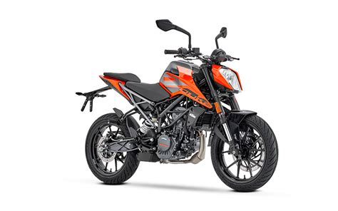 Comparatif visuel des différents modèles de la gamme KTM Duke, mettant en avant leurs caractéristiques.