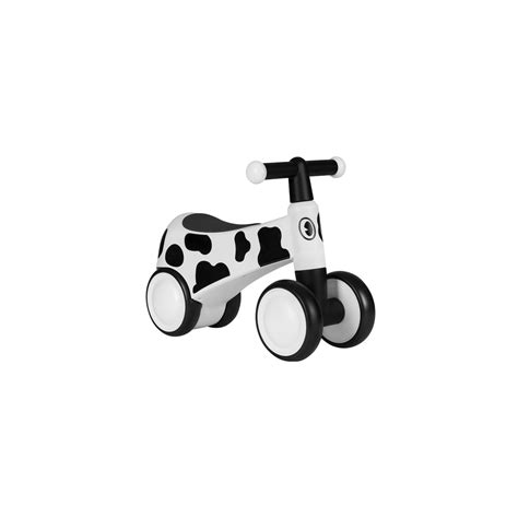 Photographie du vélo draisienne Lionelo Sammy White avec son motif de vache.