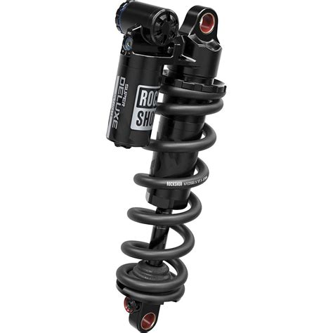 Molette de réglage du rebond basse vitesse sur un amortisseur RockShox Super Deluxe Ultimate, avec indication du sens de rotation pour ralentir le rebond (tortue)
