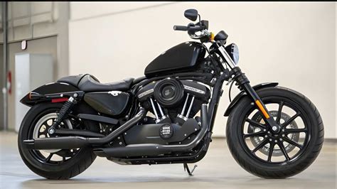 Photo d'une Harley-Davidson Sportster 883 customisée avec un échappement sport.