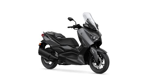 Scooter Yamaha XMAX 250 2010 de couleur bleue, vu de côté