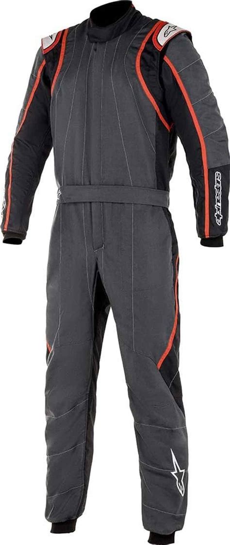 Photographie d'une combinaison de motocross/enduro rouge et noire Alpinestars, mettant en avant ses détails